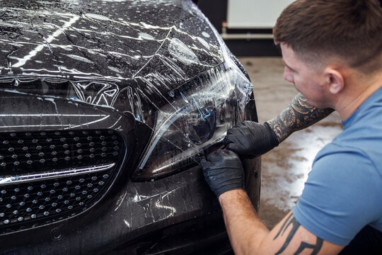 Sticker of a protective film on the headlight of a car