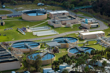 Aerial view of modern water cleaning facility at urban wastewater treatment plant. Purification...