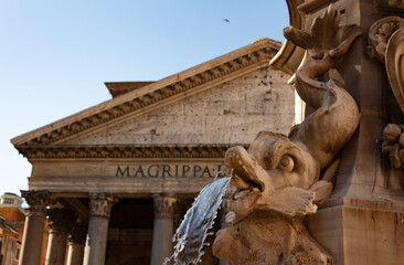 Sculpted Fountain in front of roman building