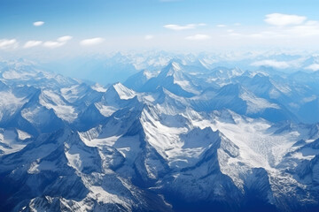 Fototapeta premium Majestic Peaks and Serene Valleys: A Breathtaking Aerial Perspective of Pristine Mountain Wilderness