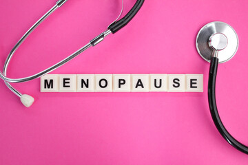 letters of the alphabet with the word Menopause. the concept of women's disease. health and medical...