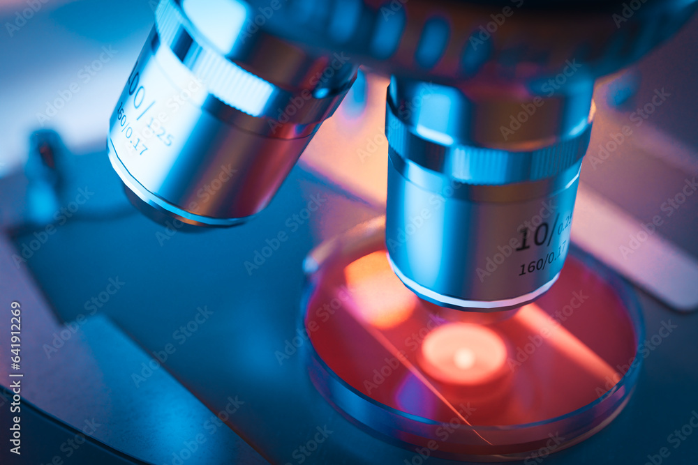 Poster background of close-up microscope of biotechnology research concept, 3d rendering