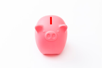 白背景にブタの貯金箱
