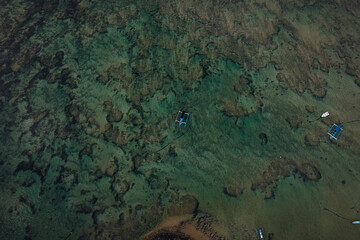 Aerial view of fishing boat in a beach.