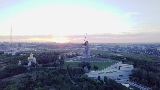 Aerial shot travelling over the 'Mamayev Kurgan' Memorial Park, showing The Motherland Calls Statue in Volgograd, Russia.