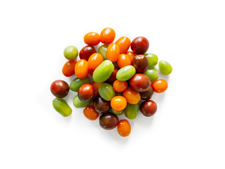 Closeup of fresh juicy organic orange, green and red cherry tomatoes from the garden isolated on a white background from above, top view