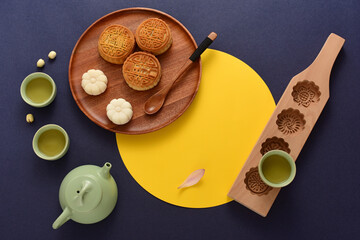 Background of Chinese Traditional Festival Mid-Autumn Festival.The Chinese meaning on the mooncake in the picture is: high-quality five kernels, milk flavored grapes, chestnuts, three flavors.