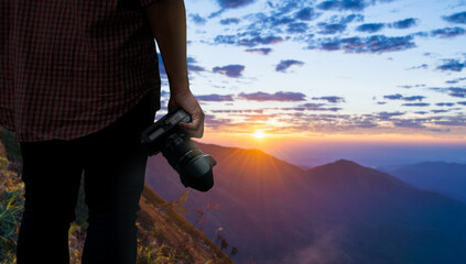 Concept for nature photography. Photographer of nature professionally and the mountain view, copy space for text.