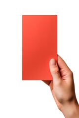 A human hand holding a blank sheet of red paper or card isolated on white background