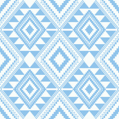 Aztec blue-white geometric pattern. Vector aztec geometric shape seamless pattern cross stitch style. Ethnic geometric stitch pattern use for textile, wallpaper, cushion, carpet, rug, upholstery, etc
