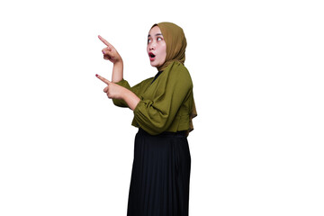 Shocked asian hijab woman with pointing finger
