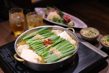 もつ鍋 Motsunabe. Giblets cooked in a hot pot Japanese food 牛腸鍋 博多 モツ鍋　鍋料理 Fukuoka Hakata
