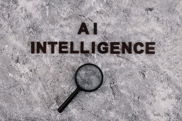AI intelligence text with magnifying glass analysing it, concept of machine learning