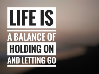 Motivational quote "Life is a balance of holding on and letting go" on blurred nature background.