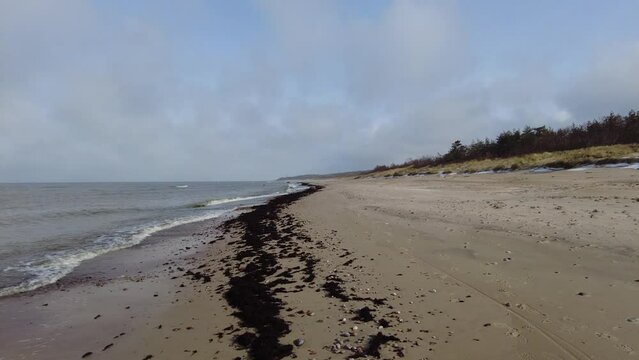 Beach and sea on cold dar day