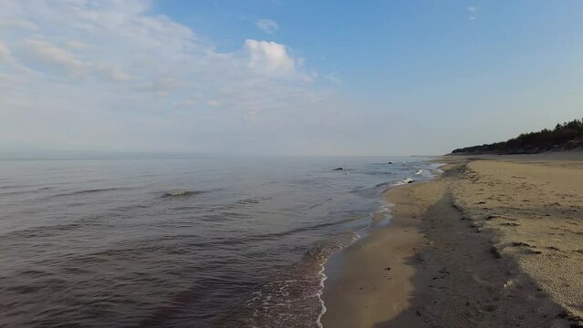 Beach and sea on cold dar day