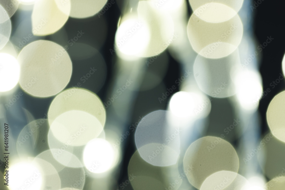 Poster multiple white bokeh lights with copy space on dark background