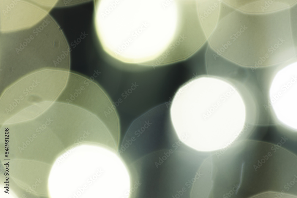 Aufkleber multiple white bokeh lights with copy space on dark background