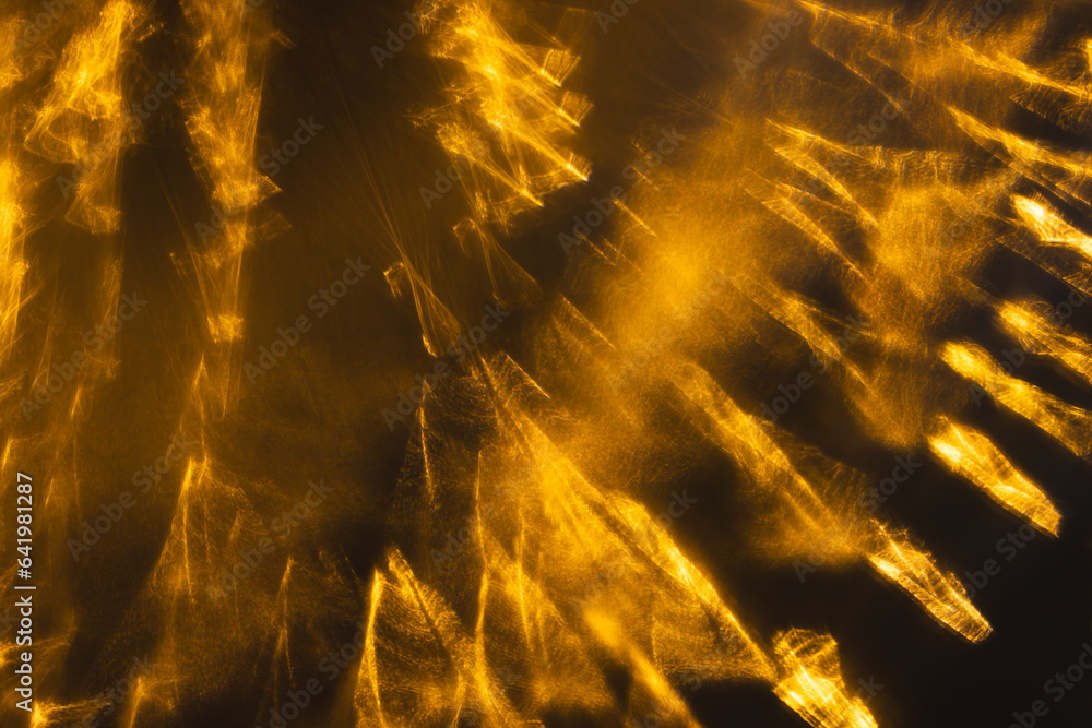 Poster yellow bokeh blurred lights with copy space on dark background