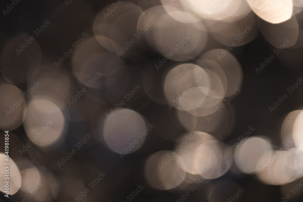 Poster white bokeh lights with copy space on dark background