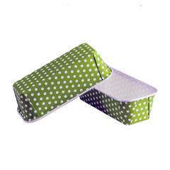 Green paper baking forms for cakes with dotted pattern