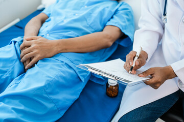 Urinary tract cancer specialists examine patients for prostate cancer. abnormal cells form and grow...