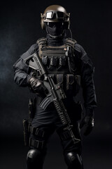 Furious elit soldier with full equip with tactical rifle on black background 