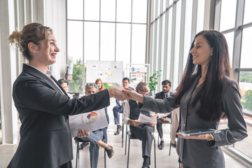 ชื่อ	
The group of employees hand in hand to show the best teamwork collaboration...