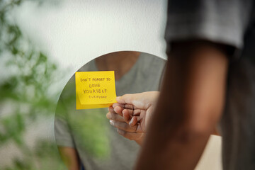 Self Love Concept. Person Reading Note on the Mirror. Mental Health Remind and Practice to Start...