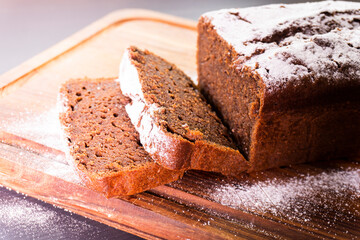 chocolate cupcake on a wooden table on a black background.food concept. dessert. bakery. diet