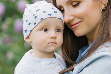 Loving young mother and her little son. Motherhood and Mother's Day