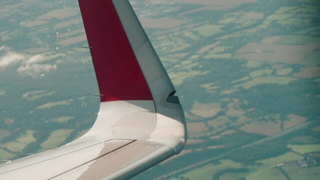Airbus A320 Neo strobe lights, nav lights and winglets filmed during flight closeup