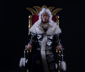portrait of medieval king on throne