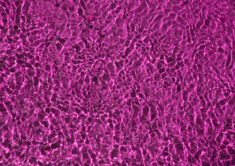 Abstract background with magenta waves and ripples