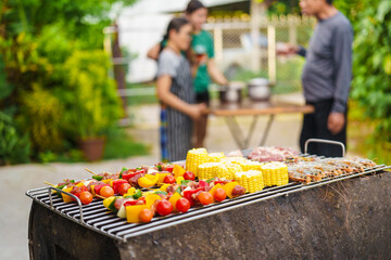 barbecue party with a happy family on weekends