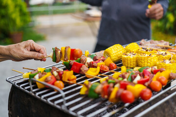 barbecue party with a happy family on weekends