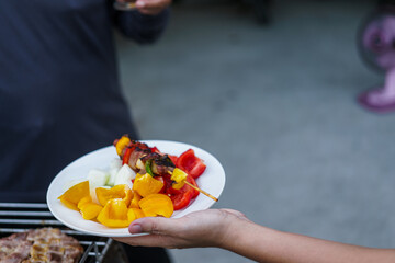 barbecue party with a happy family on weekends