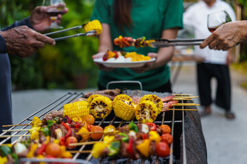 barbecue party with a happy family on weekends