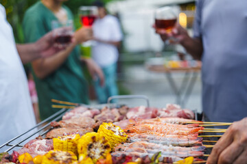 Naklejka premium barbecue party with a happy family on weekends
