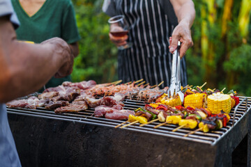 barbecue party with a happy family on weekends