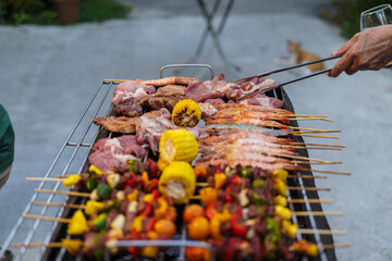 barbecue party with a happy family on weekends