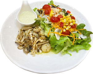 Butter grilled mushrooms and green salad. Green lettuce salad with fresh vegetables isolated 