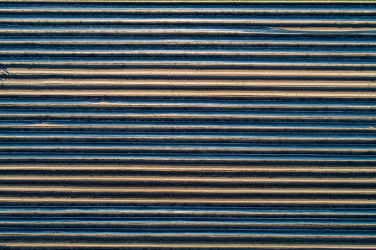 Aerial view polyethylene tunnels in rows in agricultural field, Darmstadt, Germany
