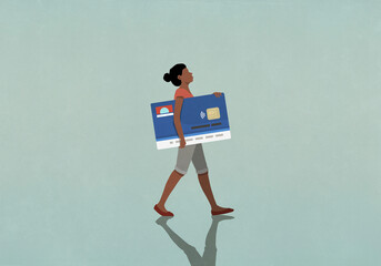 Female consumer carrying large credit card
