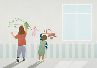 Girls drawing on wall
