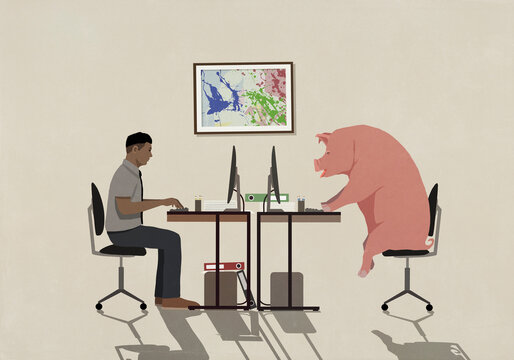 Businessman and pig working at computers in office
