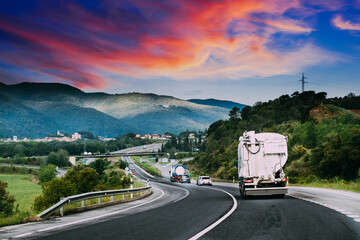 Special Concrete Transport Truck In-transit Mixer Unit In Motion On Country Road, Freeway. Freeway...