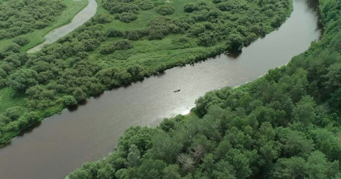 Rivers valley view from the height, swamps and green forest, kayaking, floating on a river in a forest area, background.