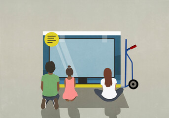 Family shopping, looking at new, large screen TV in box
