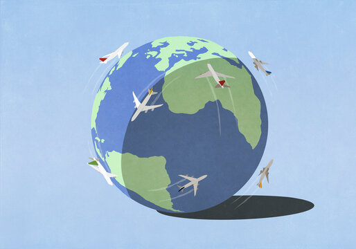 Airplanes flying around globe
